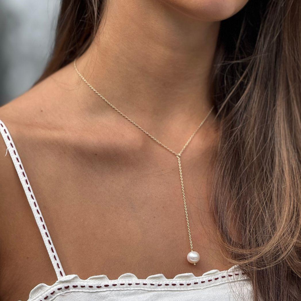 Pärlhalsband i guld med sötvattenspärla