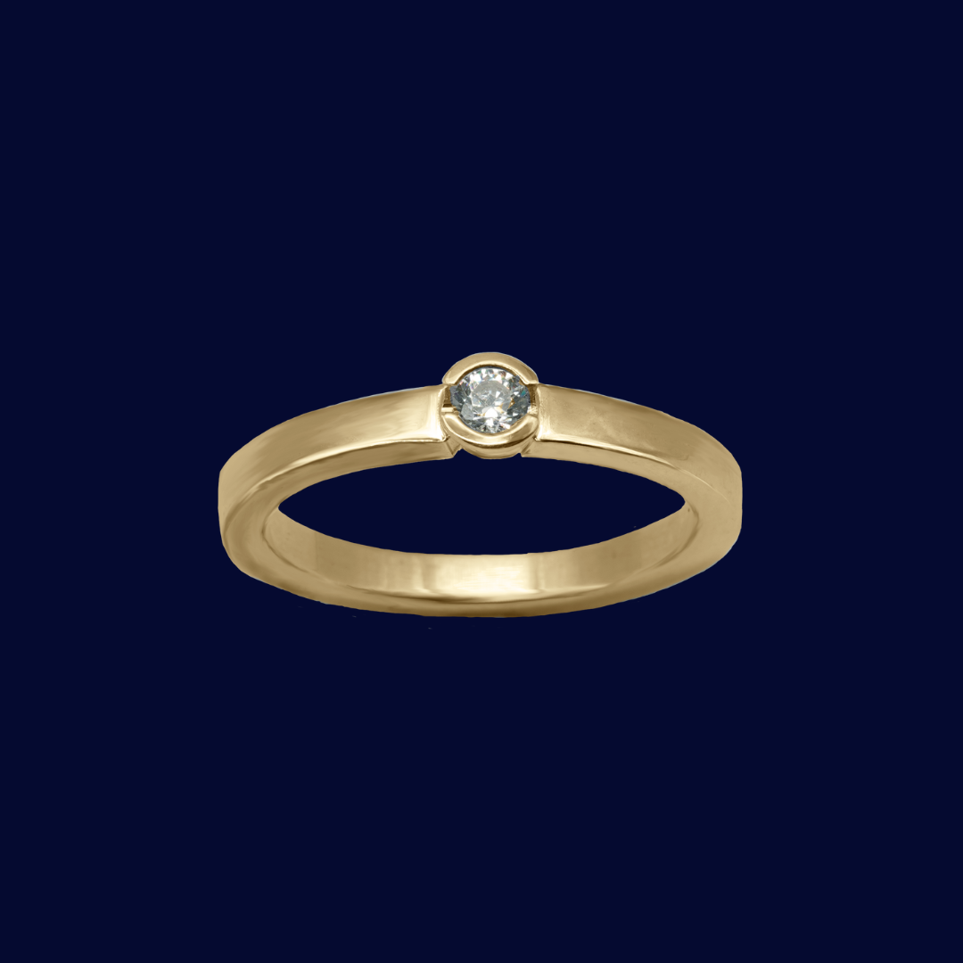 Enstensring i återvunnet guld i minimalistisk design